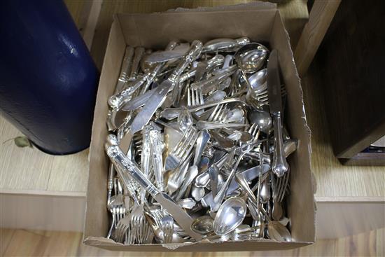 A modern 4 piece silver handled carving set and one hundred and forty three items of plated flatware